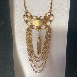 Vintage 1960s gold tone statement necklace with draped tassel